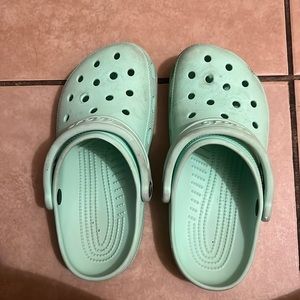 Pastel mint green crocs